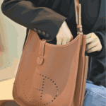 Hermès Evelyne Clemence Leather Crossbody Bag Brown - Image 4