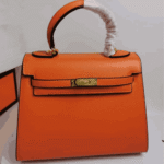 Hermès Kelly 25 Togo Leather Handbag Orange - Image 4