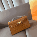 Hermès Kelly Pochette Mississippi Tabac Camel Luxury Handbag - Image 2
