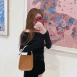 Hermès Mini Evelyne Clemence Leather Crossbody Bag Dark Brown - Image 2