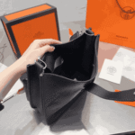 Hermès Mini Evelyne Clemence Leather Crossbody Bag Dark Brown - Image 3