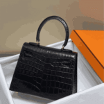 Hermès Mini Kelly K20 Leather Handbag Black Gold Hardware - Image 4