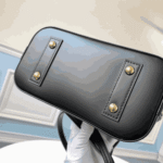 Louis Vuitton Alma BB Bag Monogram Canvas Black - Image 2