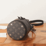 Louis Vuitton Canoé Bag Monogram Coated Canvas Brown - Image 4