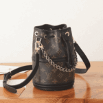 Louis Vuitton Canoé Bag Monogram Coated Canvas Brown - Image 7