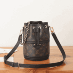 Louis Vuitton Canoé Bag Monogram Coated Canvas Brown - Image 6